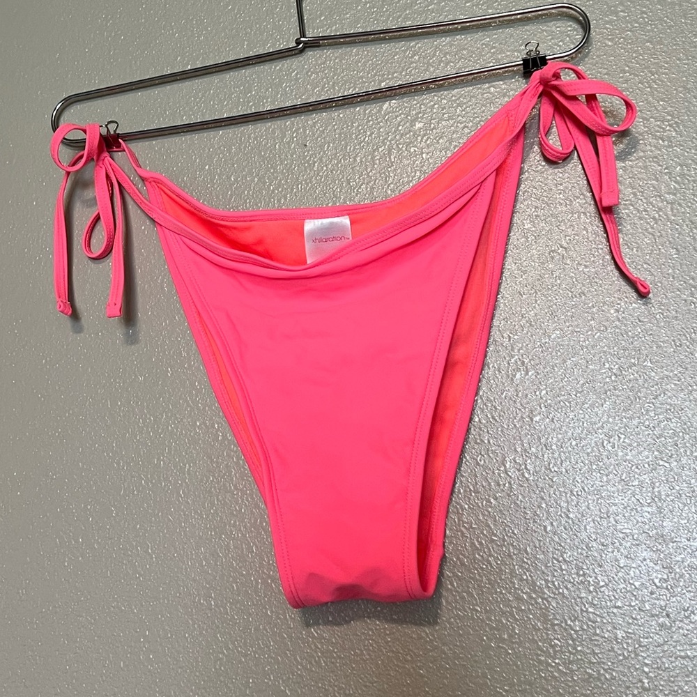 Hot pink side tie bikini bottoms, size medium, never worn. High rise semi-cheeky